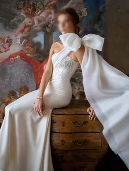 Элегантное атласное свадебное платье с пуговицами сзади и бантиками из органзы